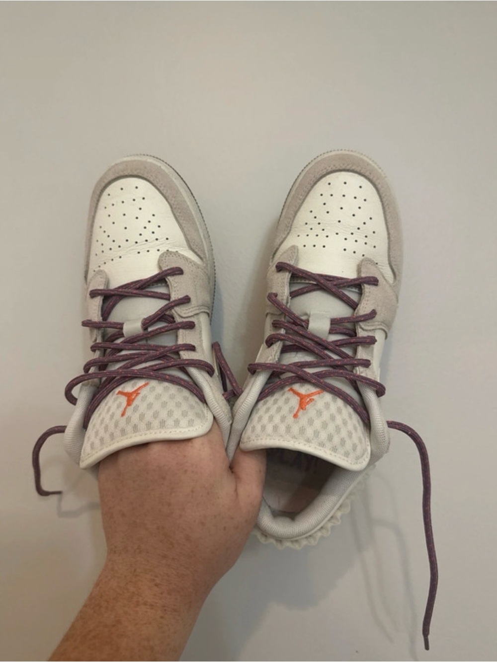 Jordan Low-Top Sneakers in White with Mauve Laces and Orange Jumpman